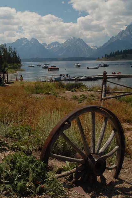 A wagonwheel makes up the landscape at Signal Mtn Lodge